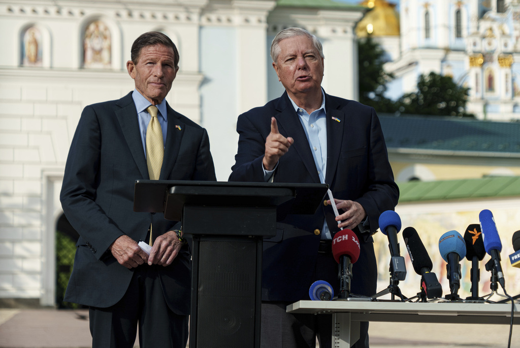 Sen. Richard Blumenthal, D-Conn., left, and Sen. Lindsey Graham, R-S.C., right, speak during a press conference in Kyiv, Ukraine.