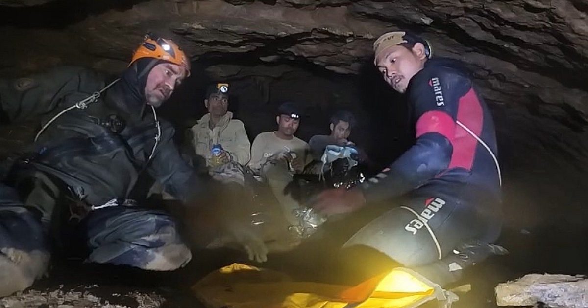 Crews rush to save miners trapped in a flooded cave in Laos