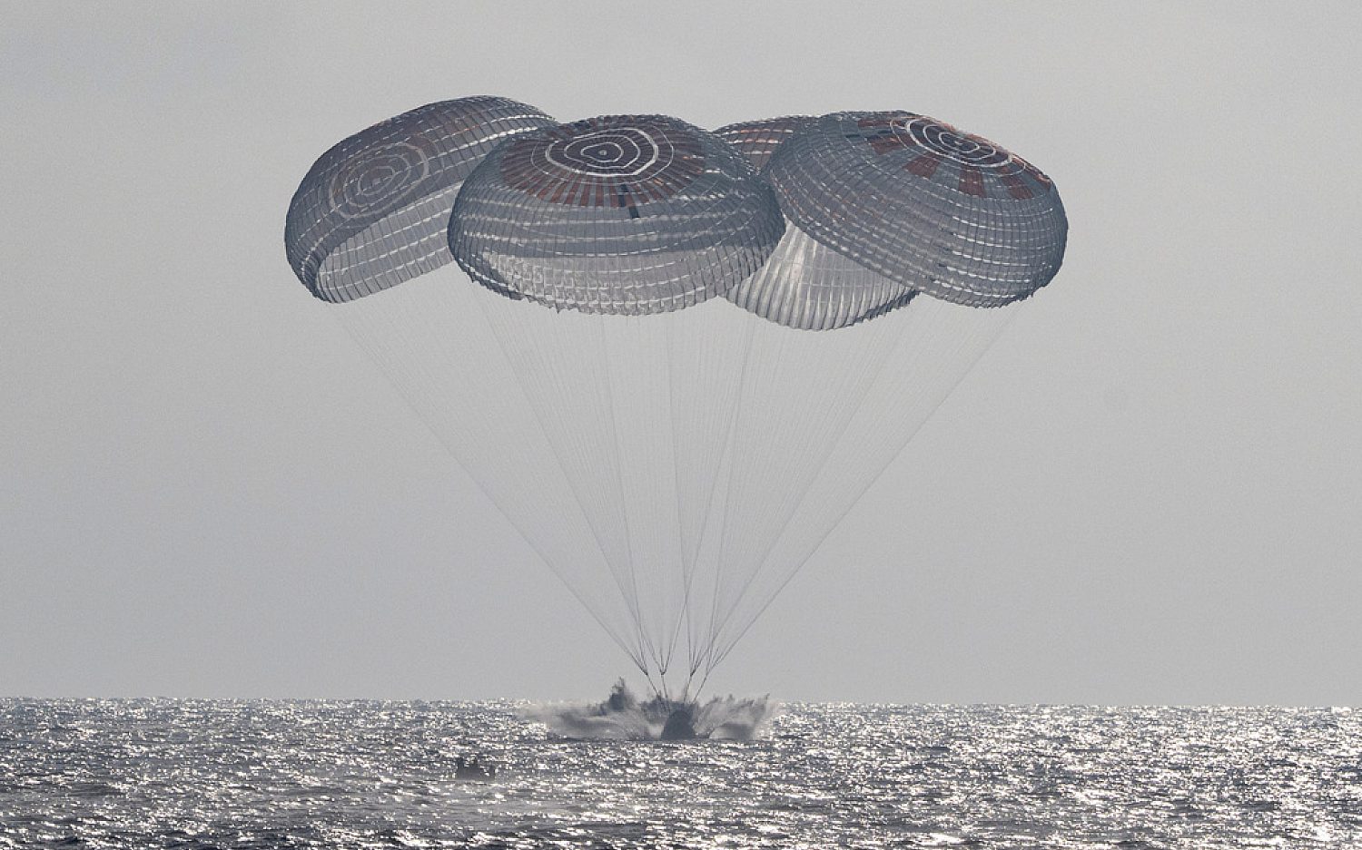 Crew of International Space Station returns safely to Earth