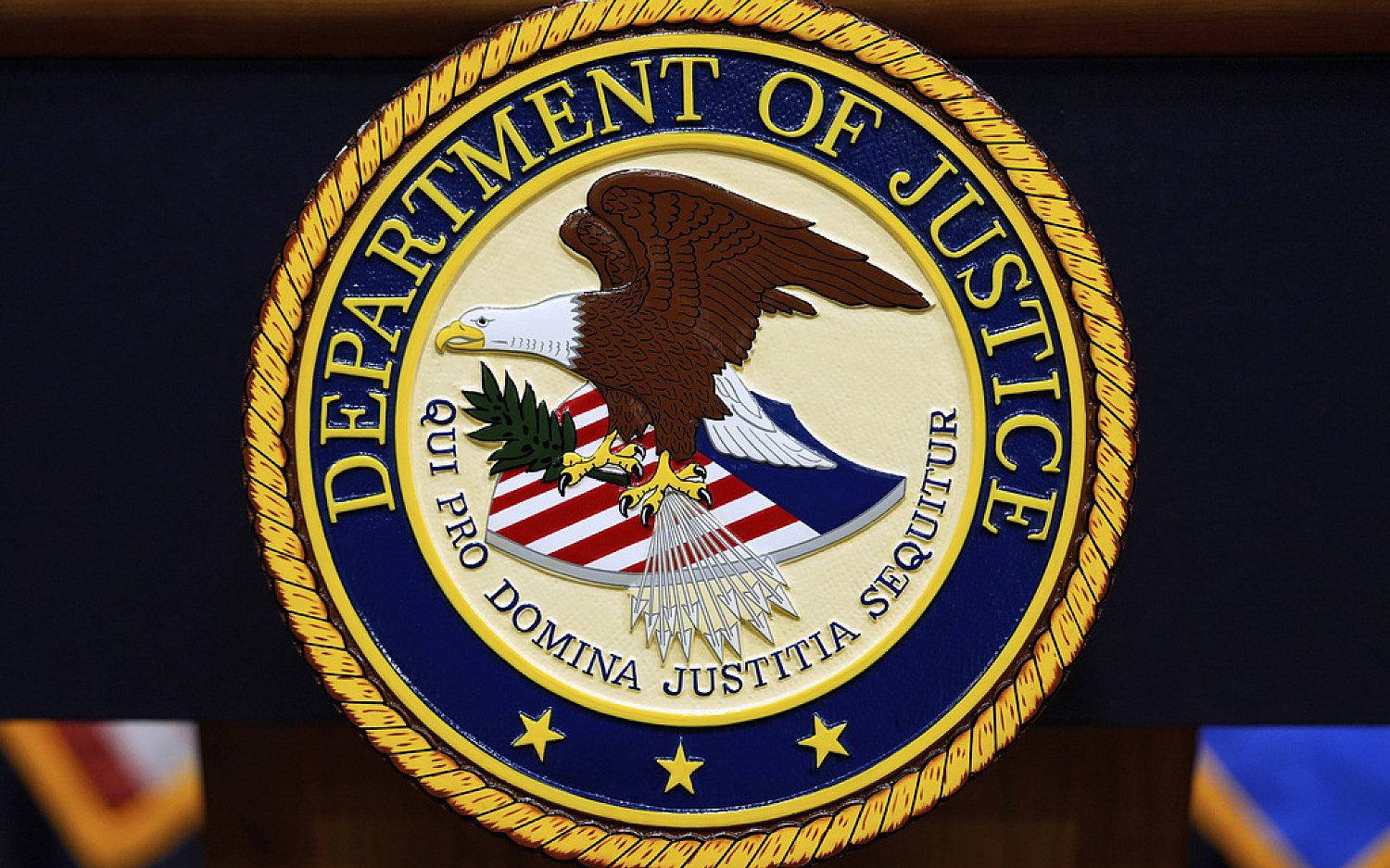 DOJ staffer fired, charged with throwing food at CBP agent