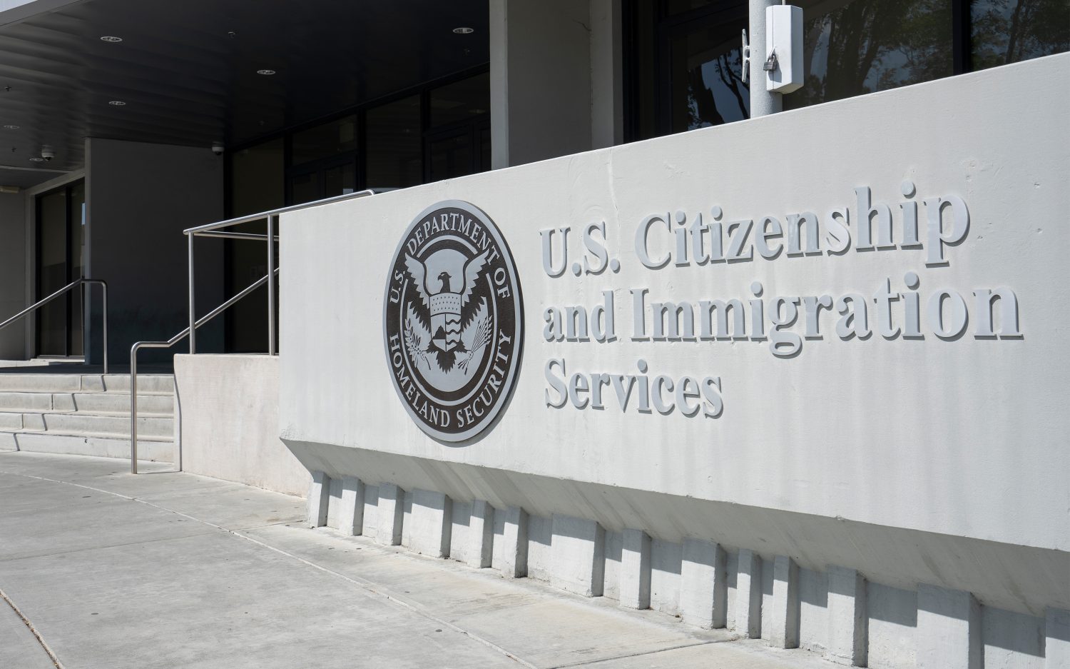 Weighing the price of $100,000 worker visas