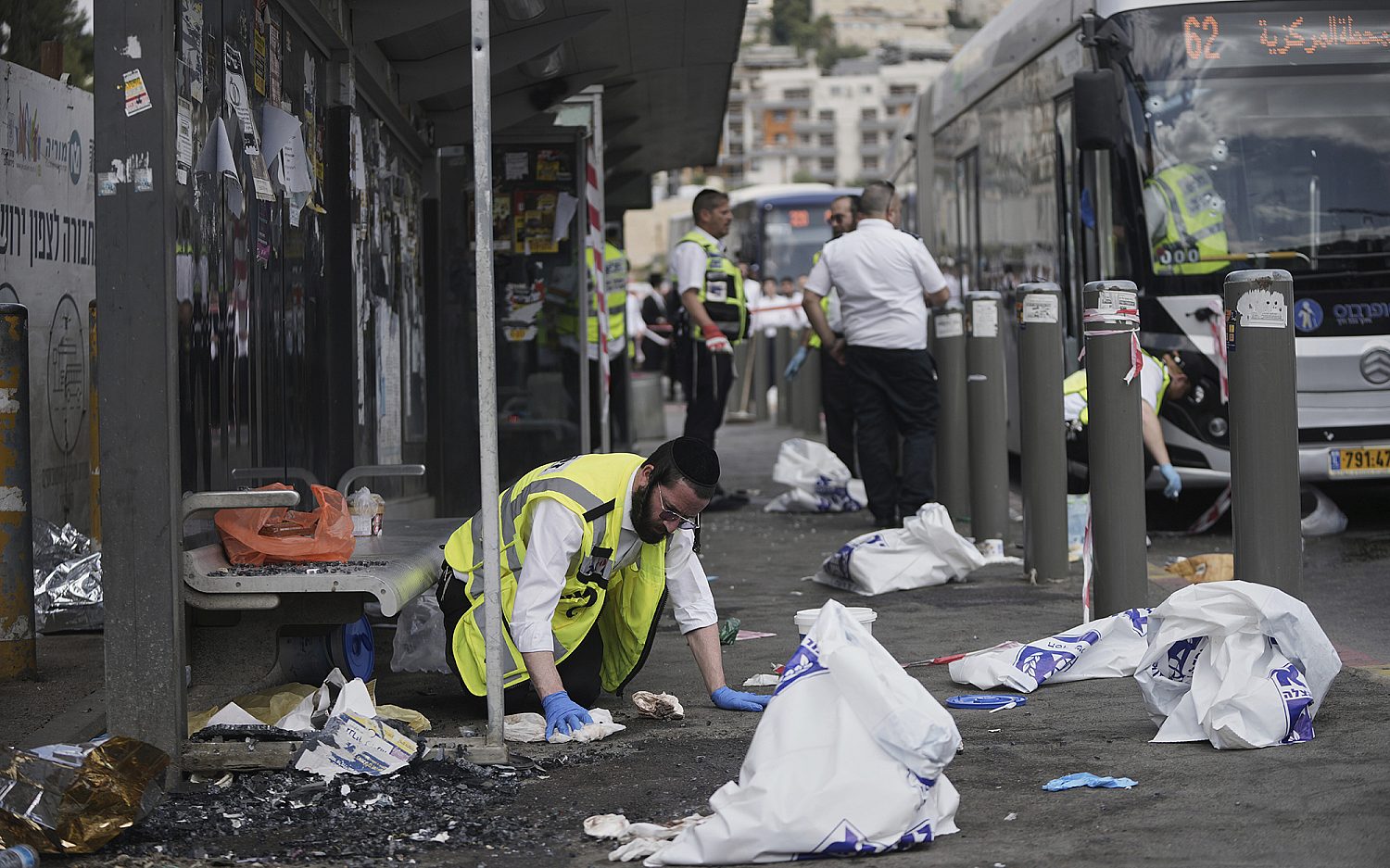 Attackers fire on Jerusalem bus stop, killing six