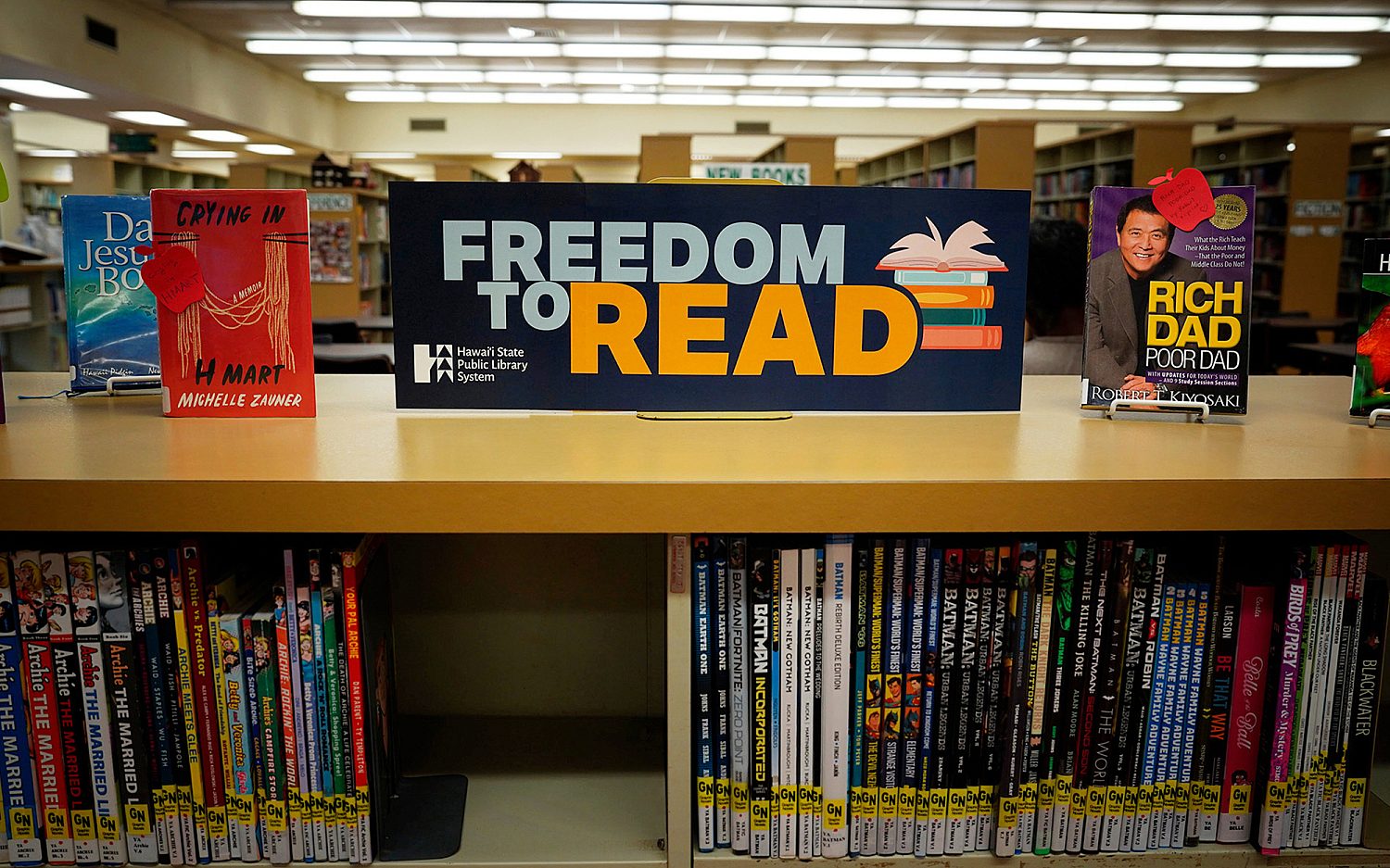 County, librarian settle lawsuit after firing, books debate