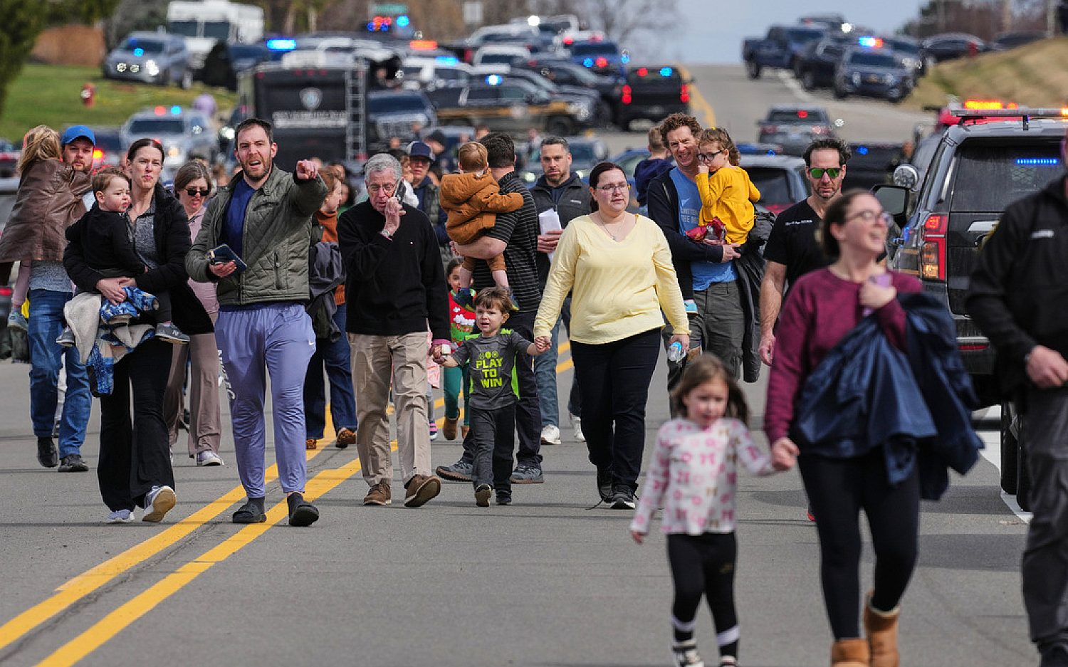 Suspect drives truck into Michigan synagogue, opens fire