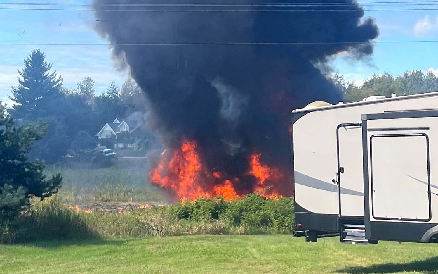 Fighter jet crashes in rural Michigan, neighborhood evacuated