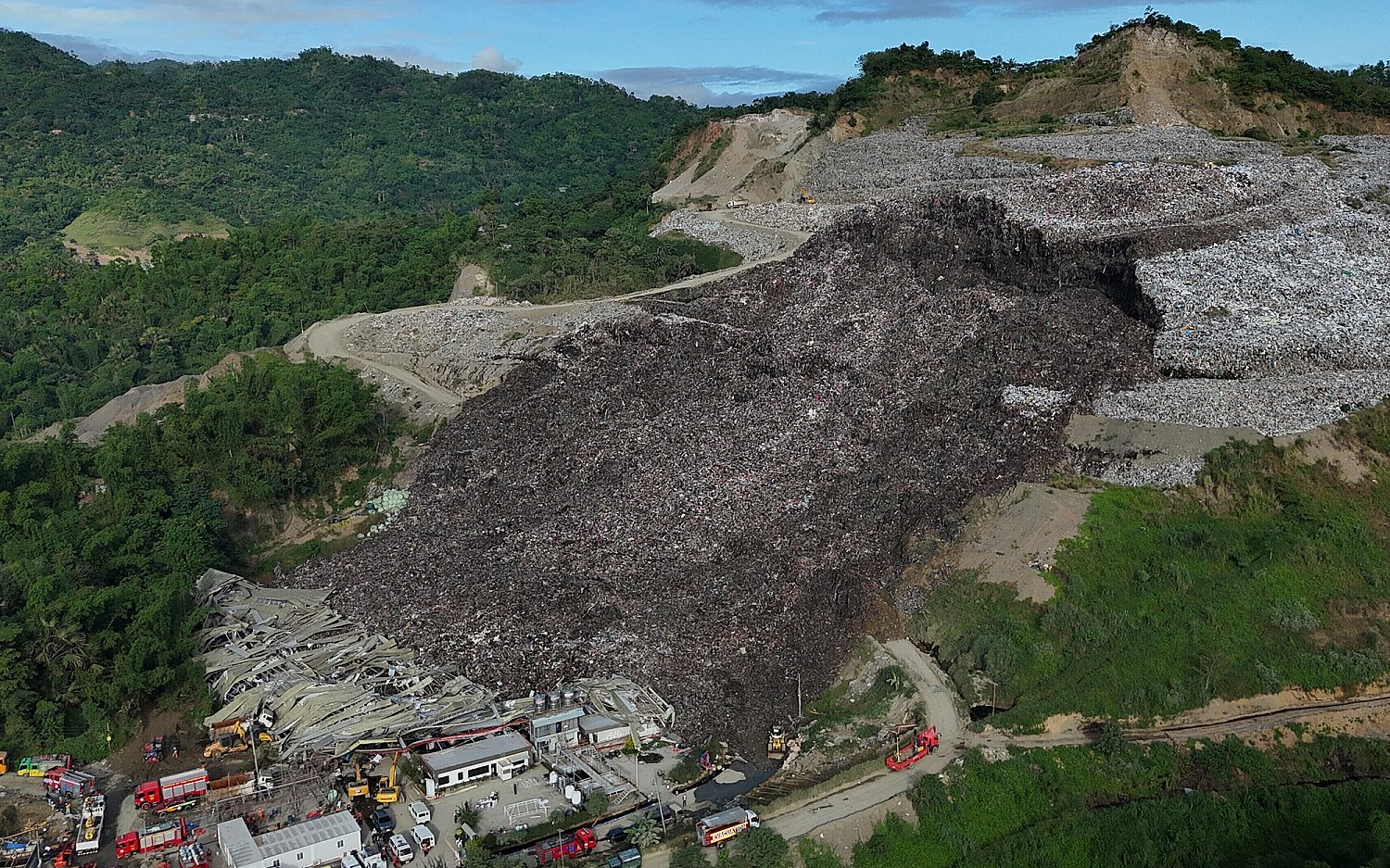 Dozens missing after Philippines garbage mound collapse, killing three