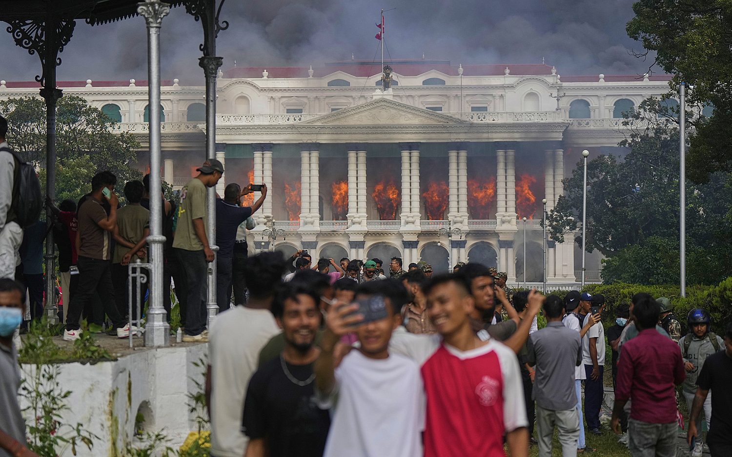 Nepal’s prime minister resigns as fiery protests continue